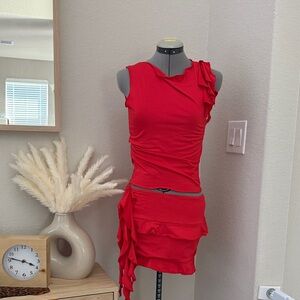 Red Sleeveless Ruffled mini skirt with top.